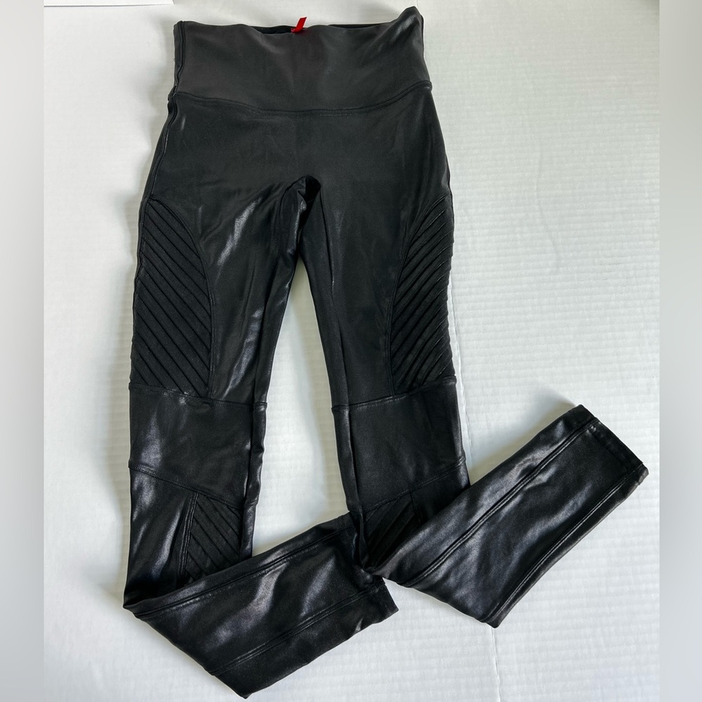 Women’s Spanx Moto faux leather black leggings. Size M